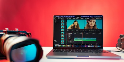 Video editing software on laptop