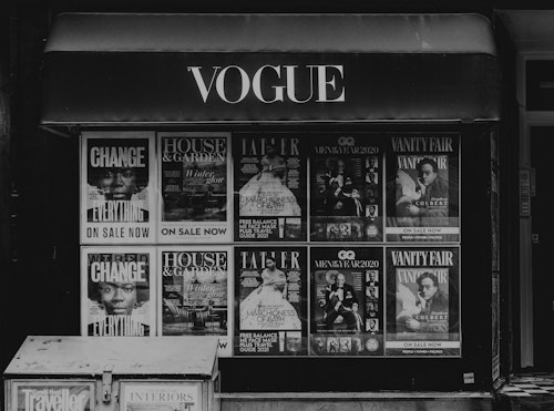 Black and white image of magazine stand