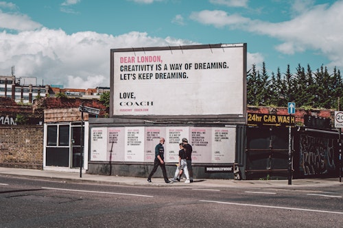 Billboard reads: Dear London, creativity is a way of dreaming. Let's keep dreaming.