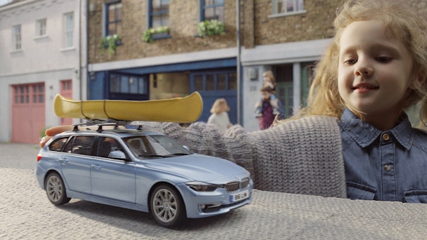 Still from Gumtree Ad showing a little girl and toy car