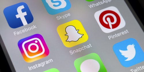 Image of Snapchat app logo on phone screen
