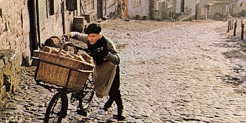 Boy pushes bike in Hovis ad