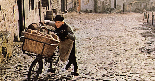 Boy pushes bike in Hovis ad