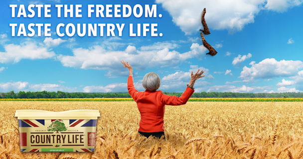 THERESA MAY COUNTRY LIFE AD RUNNING THROUGH FIELDS OF WHEAT