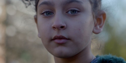 Still of young girl from Plan International ad