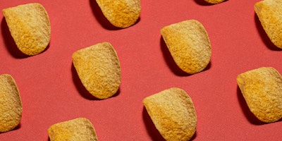 Pringles displayed neatly against a red background