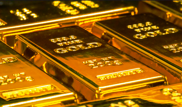 Hallmarks on glistening gold bars