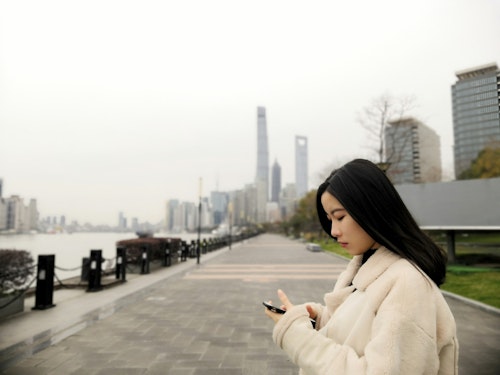 A Chinese woman on a mobile phone in China