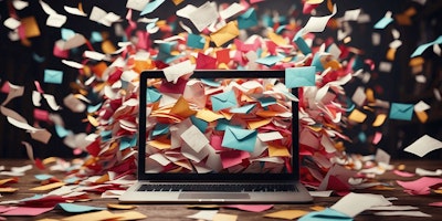 A laptop showing lots of content marketing notifications (represented by envelopes)