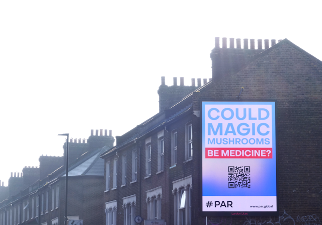 A digital billboard from the Psilocybin Access Rights group