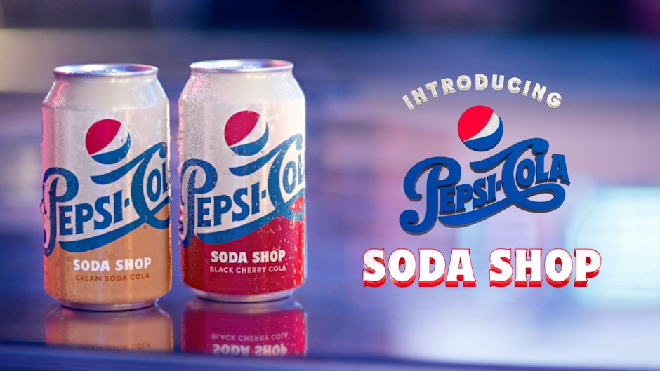 Two cans of Pepsi-Cola Soda Shop colas