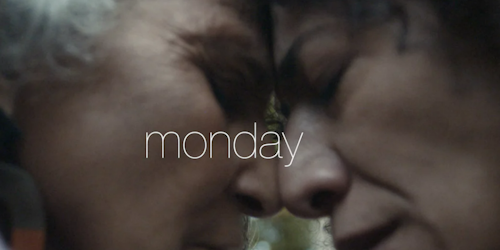 two people embracing with "Monday" text
