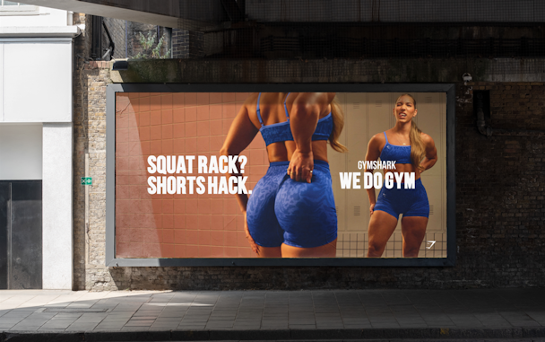 Gymshark billboard with a girl wearing leggings 