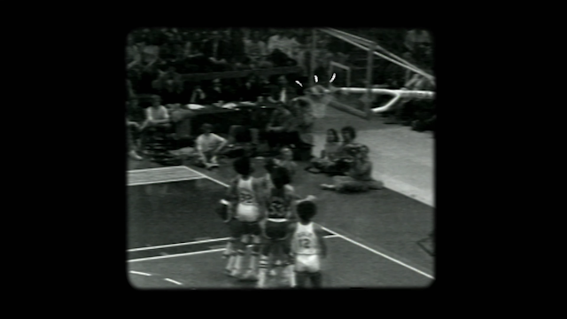 Black and white photo of a basketball game